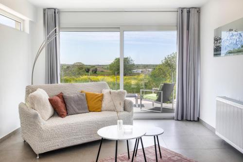 Gallery image of White Lotus Jacuzzi Villa, Afitos #FeelsLikeHome in Afitos