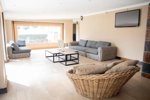 Χώρος καθιστικού στο The African Penguin Guesthouse