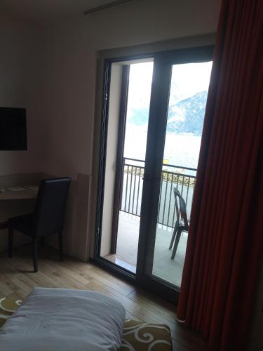 Ένα ή περισσότερα κρεβάτια σε δωμάτιο στο Hotel Sole Malcesine