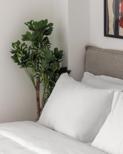 Katil atau katil-katil dalam bilik di Babylon Luxury Suites No2 by BiNoBi!