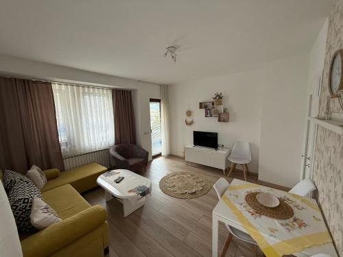 a living room with a couch and a table at Villa Lucija in Ohrid