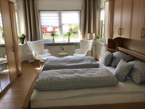 Postel nebo postele na pokoji v ubytování Wohnung im Grünen