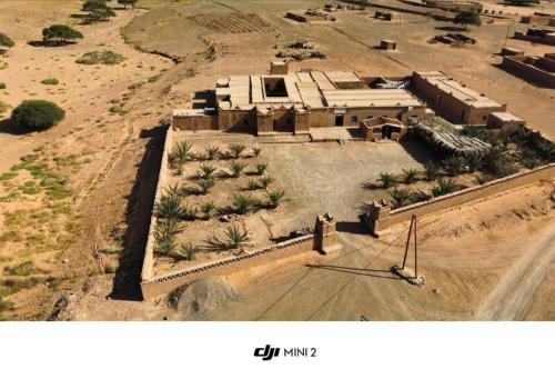 an aerial view of a building in the desert at Auberge Dar Lajdoud in Tafraoute Sidi Ali