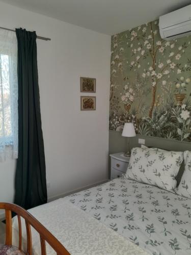 Postel nebo postele na pokoji v ubytování Cortile Fiorito B&B