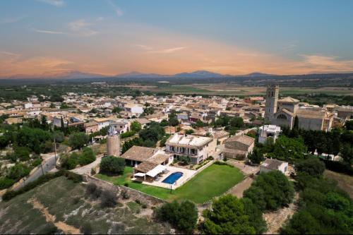an aerial view of a small town with houses at Sa Figuereta Living Place in Ariany