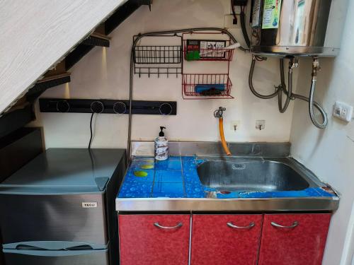 Kuchyň nebo kuchyňský kout v ubytování Checheng Backpackers Hostel