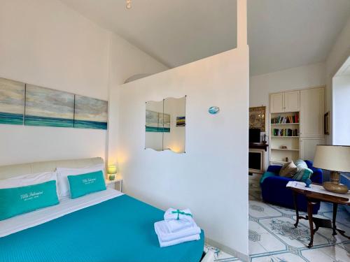 Posteľ alebo postele v izbe v ubytovaní Villa Falconieri Sorrento Suite