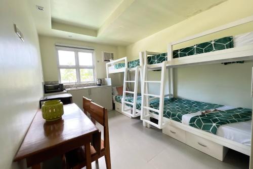 Ένα ή περισσότερα κρεβάτια σε δωμάτιο στο Accessline Inn Boracay powered by Cocotel