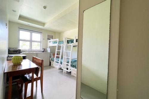 Ένα ή περισσότερα κρεβάτια σε δωμάτιο στο Accessline Inn Boracay powered by Cocotel