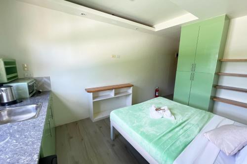 Ένα ή περισσότερα κρεβάτια σε δωμάτιο στο Accessline Inn Boracay powered by Cocotel