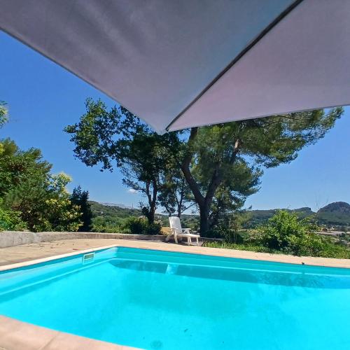 Bazén v ubytování Confortable studio au calme avec accès piscine et parking nebo v jeho okolí