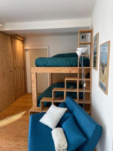 Ένα ή περισσότερα κρεβάτια σε δωμάτιο στο Logement 4 personnes à 2 pas du Lac, Lacanau