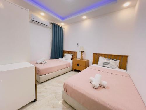 Postel nebo postele na pokoji v ubytování selena bay resort
