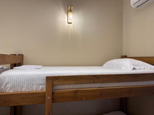 Postel nebo postele na pokoji v ubytování Vila Kaci