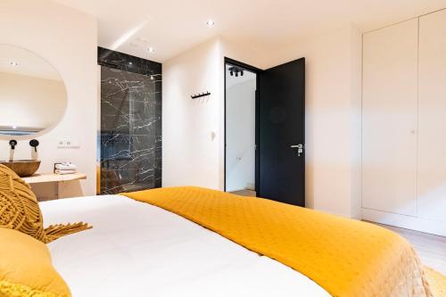 Ένα ή περισσότερα κρεβάτια σε δωμάτιο στο Luxe stal appartement