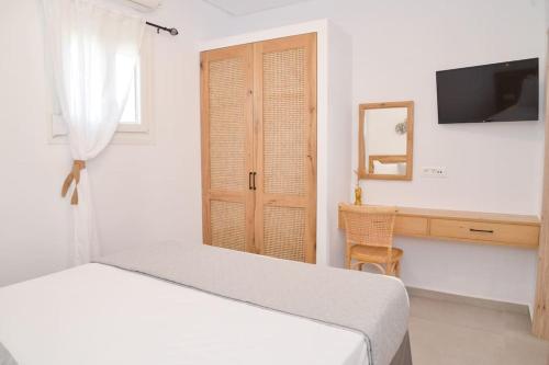 Postel nebo postele na pokoji v ubytování Theros apartment II in Milos
