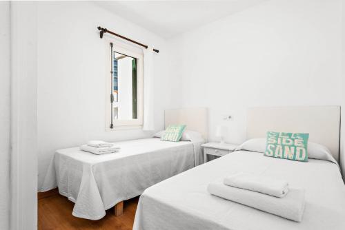 Ένα ή περισσότερα κρεβάτια σε δωμάτιο στο Apartamento Aire Mari by Escapehome