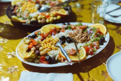 a plate of food on top of a table at Sky Luxury Camp in Mhamid