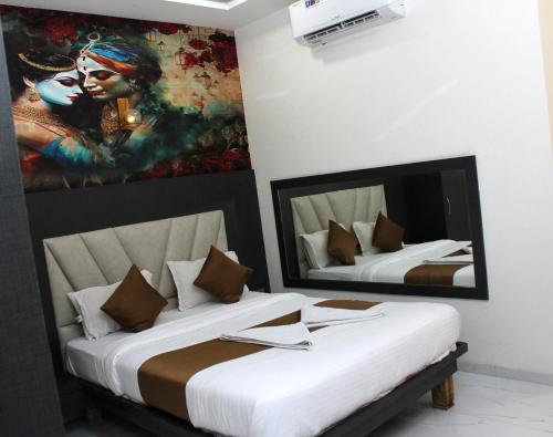 Katil atau katil-katil dalam bilik di Hotel Aayan Lodging & Boarding