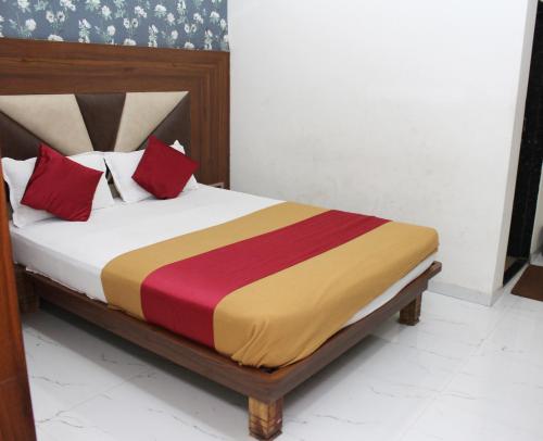 Katil atau katil-katil dalam bilik di Hotel Aayan Lodging & Boarding