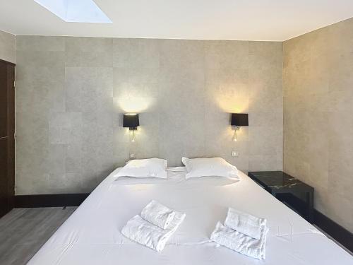 Postel nebo postele na pokoji v ubytování Hoche