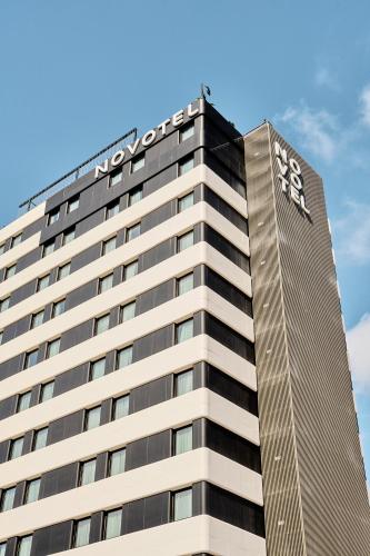 a building with a nordisk sign on it at Novotel Valencia Lavant in Valencia