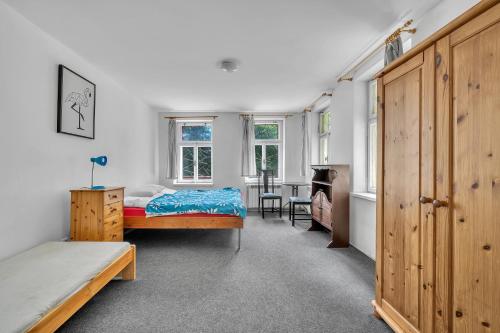 Postel nebo postele na pokoji v ubytování Apartmán pod Mariánskou horou