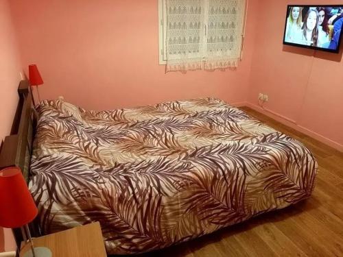 Postel nebo postele na pokoji v ubytování Appartement accueillant à Saint-Jean-Pied-de-Port, 69 m²