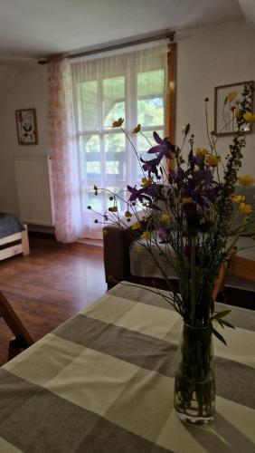 Ένα ή περισσότερα κρεβάτια σε δωμάτιο στο Dach Pod Sową