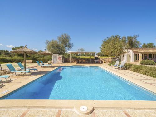 The swimming pool at or close to Holiday Home Can Soler by Interhome