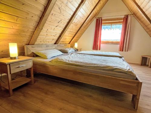 Ένα ή περισσότερα κρεβάτια σε δωμάτιο στο Holiday Home Backhäusle by Interhome