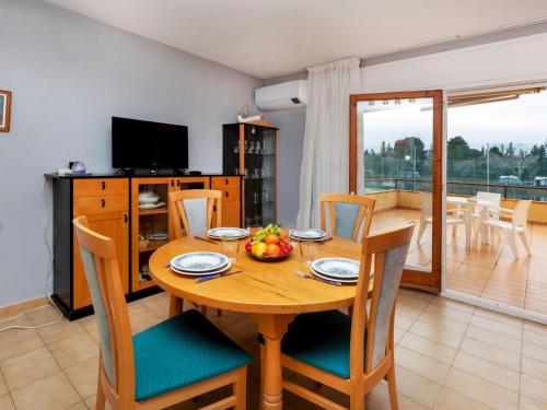 TV a/nebo společenská místnost v ubytování Apartment Del Lago by Interhome