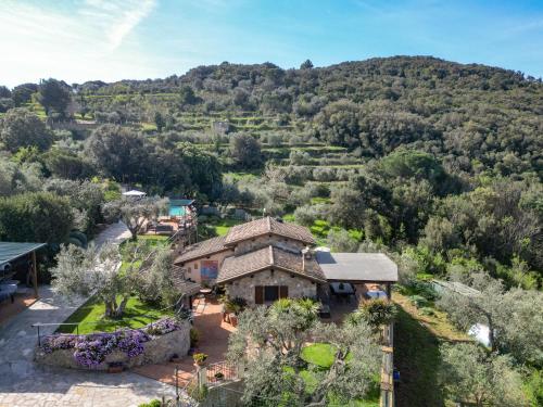una vista aérea de una casa en las colinas en Villa Ricali by Interhome, en Porto Santo Stefano
