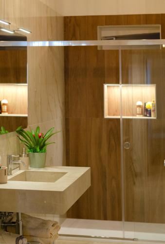 a bathroom with a shower and a sink at Brezza Marina in Mattinata