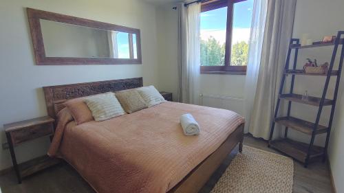 Katil atau katil-katil dalam bilik di Oceana Suites Refugio Alerce
