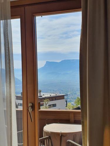 a view from a window with a table and chairs at B&B Hotel Mair am Turm in Tirolo
