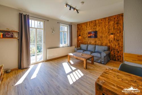 Χώρος καθιστικού στο Auszeit im Harz Haus 1 Wohnung Feuerstein