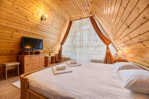 Postel nebo postele na pokoji v ubytování FLH - Emprin House