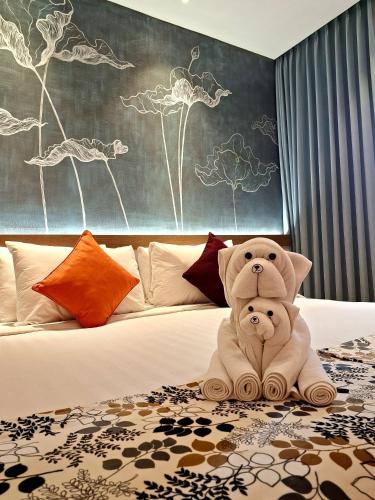 Postel nebo postele na pokoji v ubytování Hotel Sriti Magelang