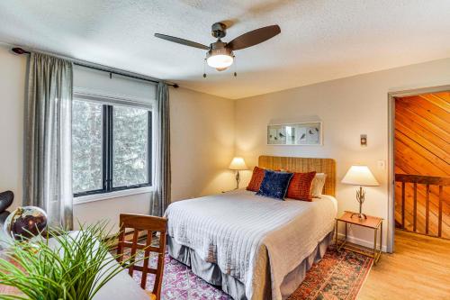 a bedroom with a bed and a window at Walk to Town and Slopes Riverfront Breckenridge Gem in Breckenridge