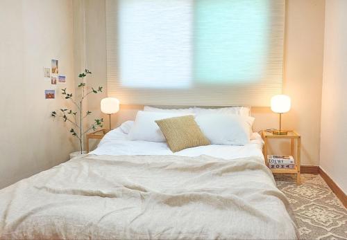 Postel nebo postele na pokoji v ubytování #Daewangam Park #Seuldo Island #Ilsan Beach # OnDam Stay #Rest