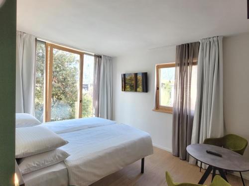 Postel nebo postele na pokoji v ubytování Locanda Restel De Fer