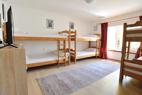 Postel nebo postele na pokoji v ubytování Hostel David