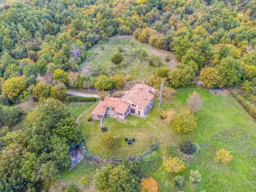 an aerial view of a house on a hill at Holiday Home Bellavista - Villi by Interhome in Montieri