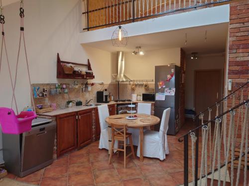 Kuchyň nebo kuchyňský kout v ubytování Belvárosi kikapcs!