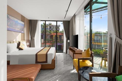Postel nebo postele na pokoji v ubytování Khue Le Bleu Villa - Hải Tiến