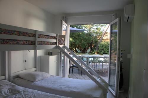 Ένα ή περισσότερα κρεβάτια σε δωμάτιο στο La clé des chênes