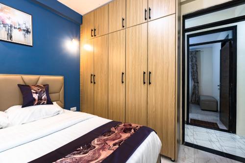 Ένα ή περισσότερα κρεβάτια σε δωμάτιο στο Sunbeam Residences