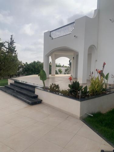 Κήπος έξω από το Villa Les Étoiles, Djerba