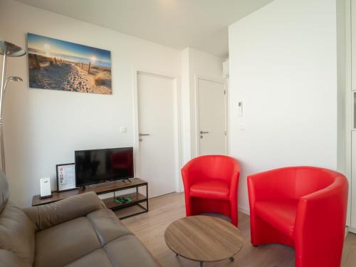 TV a/nebo společenská místnost v ubytování Holiday Home New Dahlia 8 by Interhome